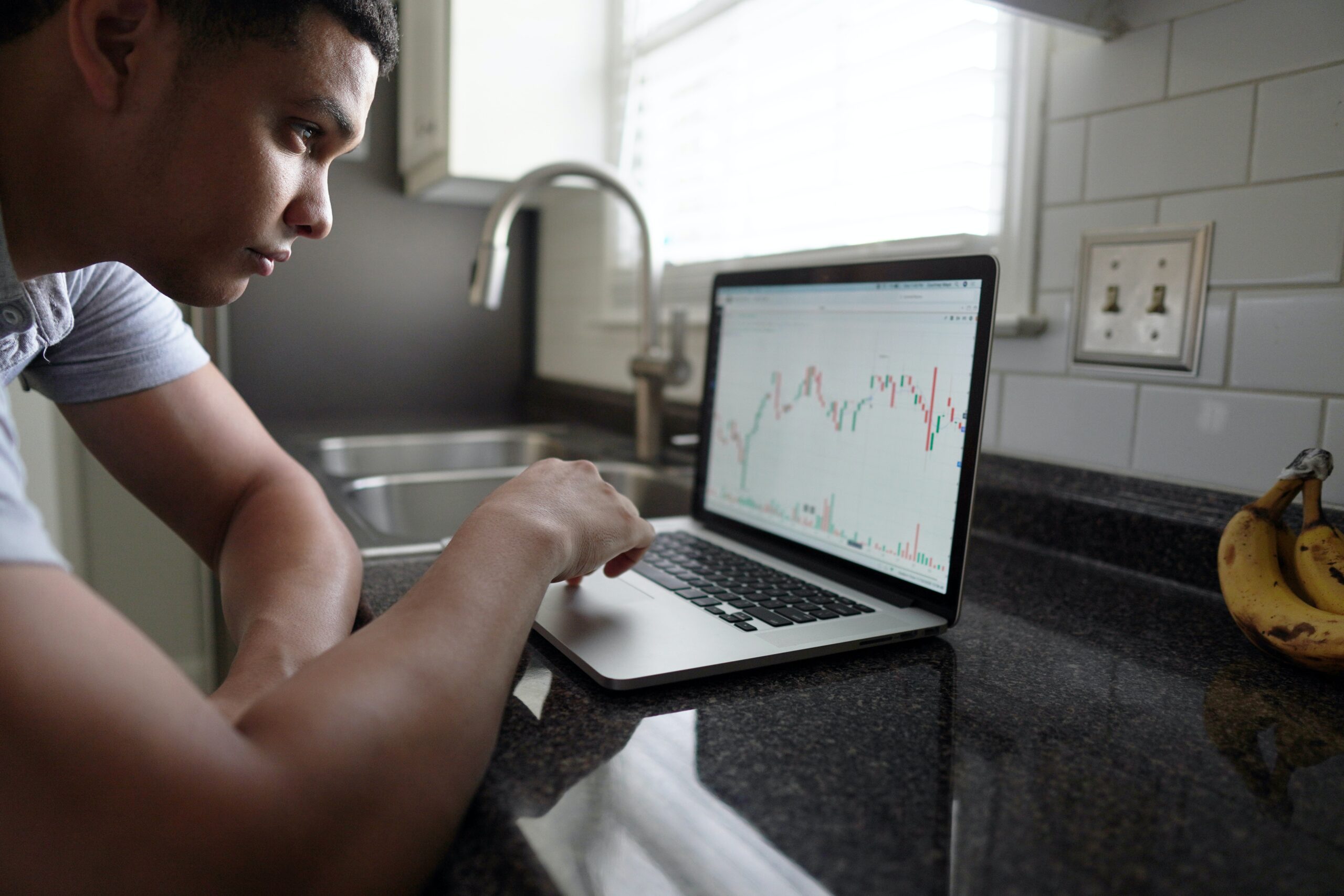 Man looking at stock chart