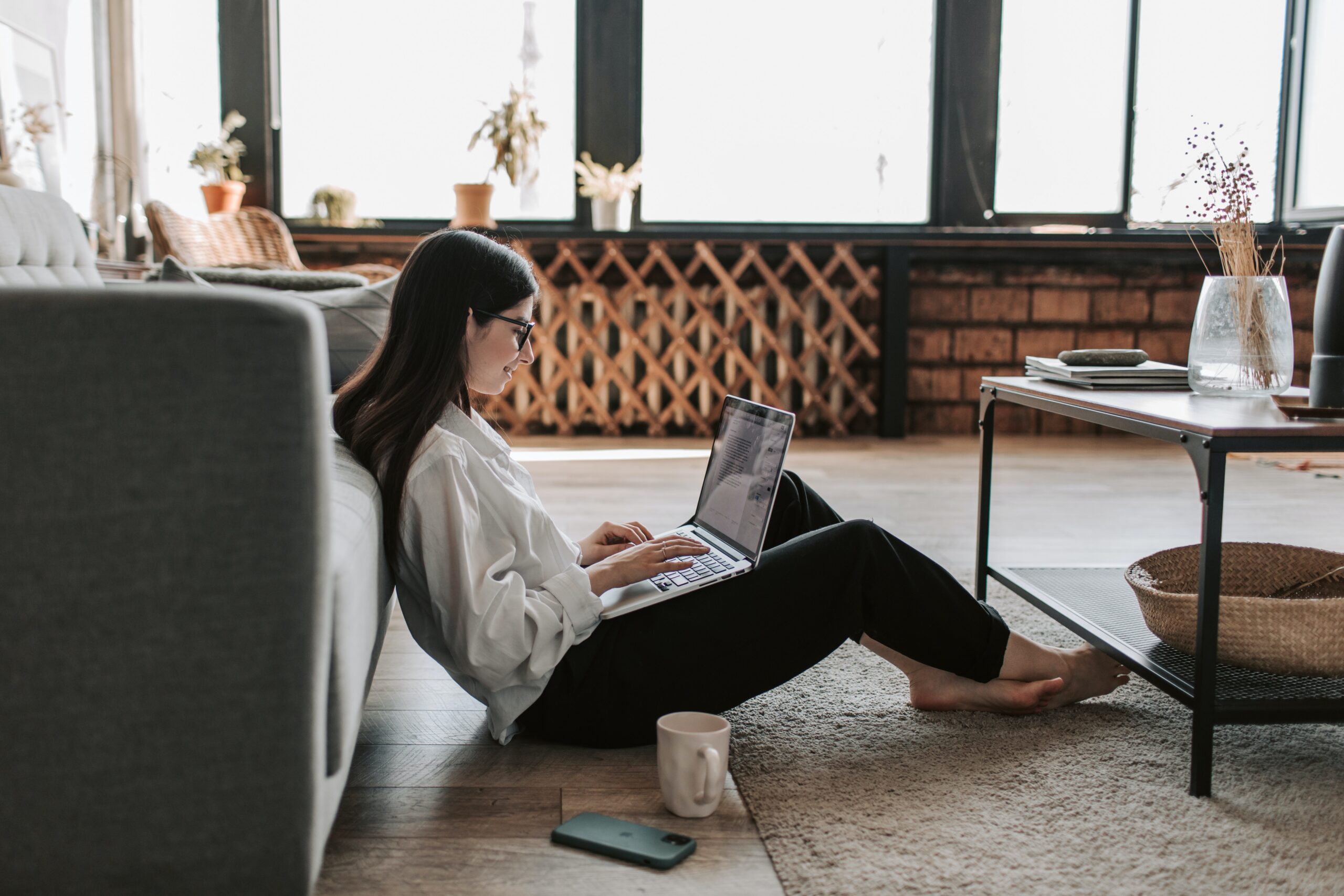 Girl behind screen sitting down